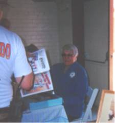 Robert signing autographs in Tombstone